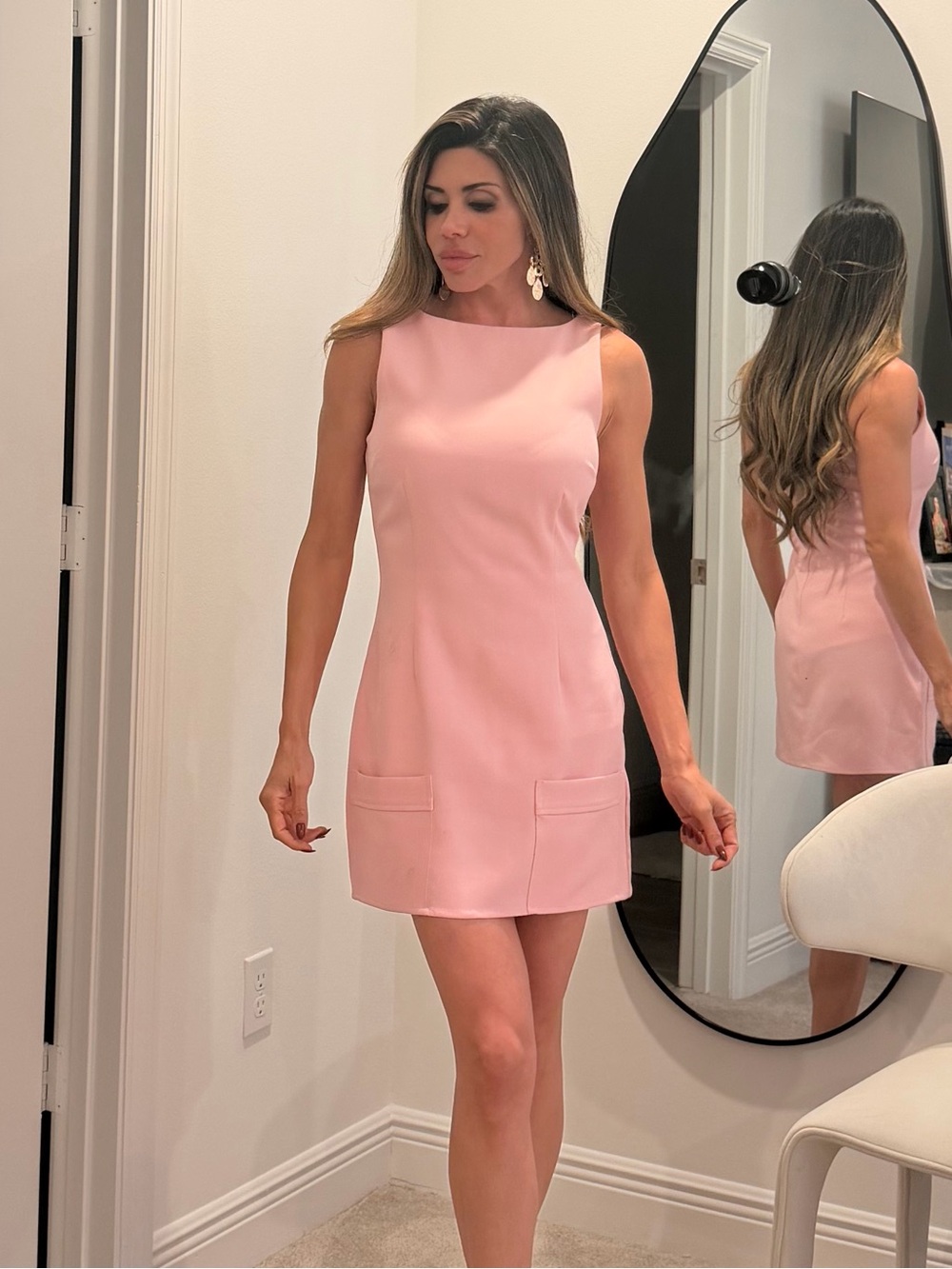 Chic Sleeveless Pink Mini Dress with Pocket Detail